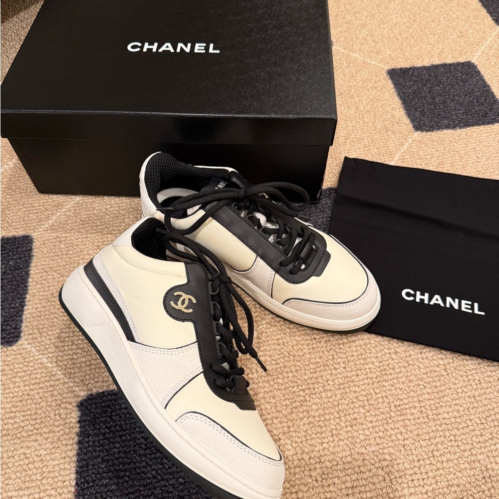 CHANEL Black and Cream Sneakers